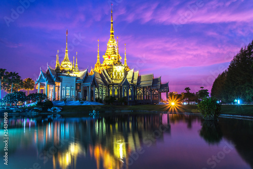 beautiful temple thailand dramatic colorful sky twilight sunset shadow on water reflection with light