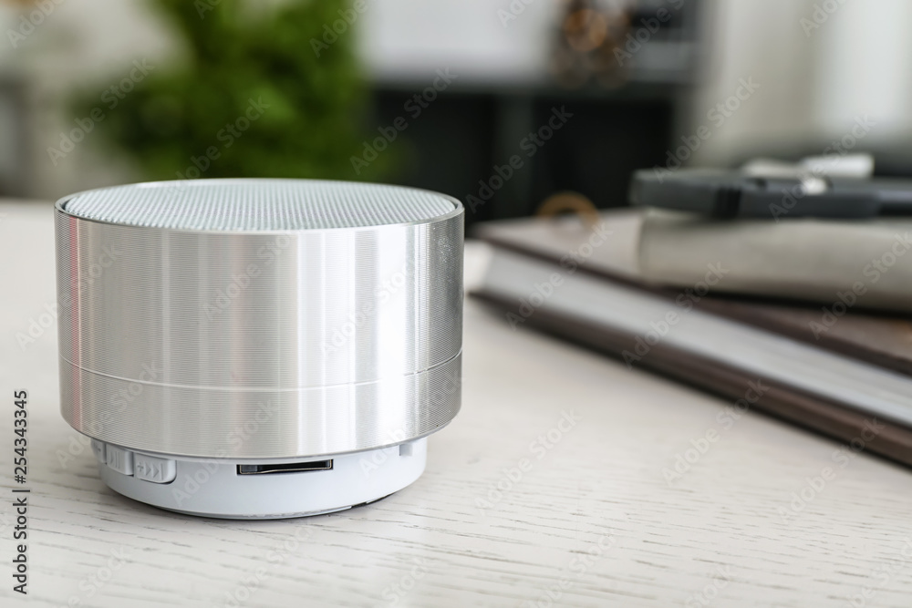 Smart home assistant device on table in room Smart home assistant device on table in room