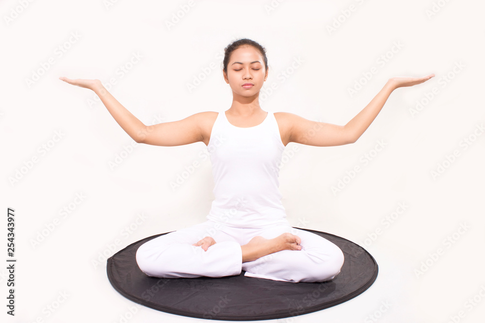 yoga pose women sitting hand balance. Pretty asian woman in pose lotus yoga pose women sitting hand balance. Pretty asian woman in pose lotus