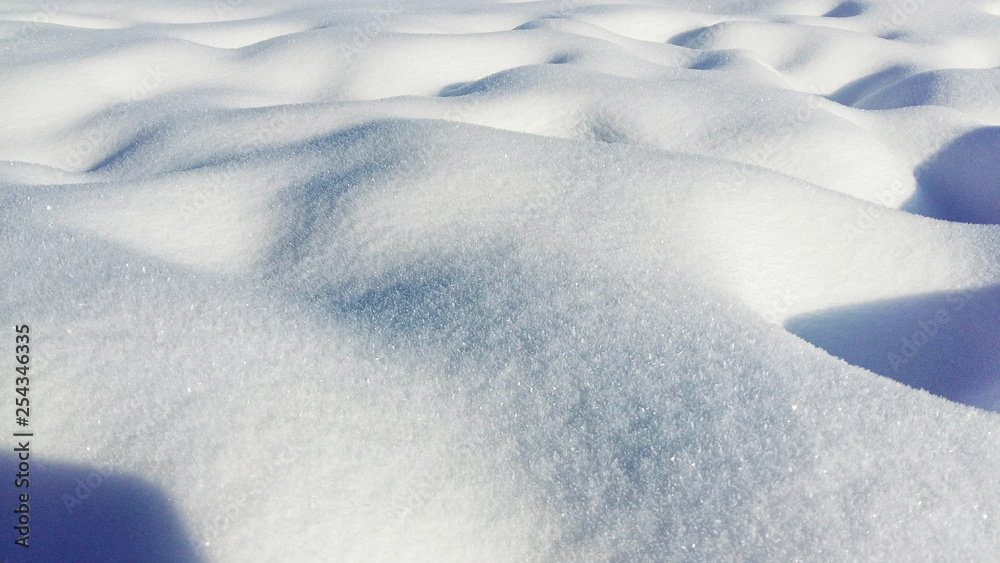 background of fresh snow texture in blue tone. Panoramic background of fresh snow texture in blue tone. Panoramic