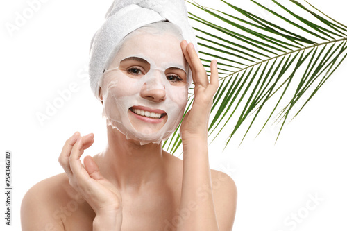 Woman with sheet facial mas...