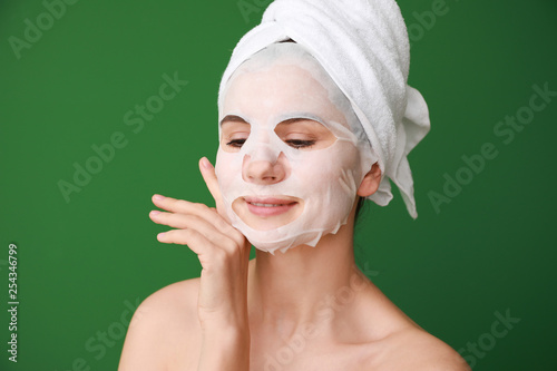 Woman with sheet facial mas...