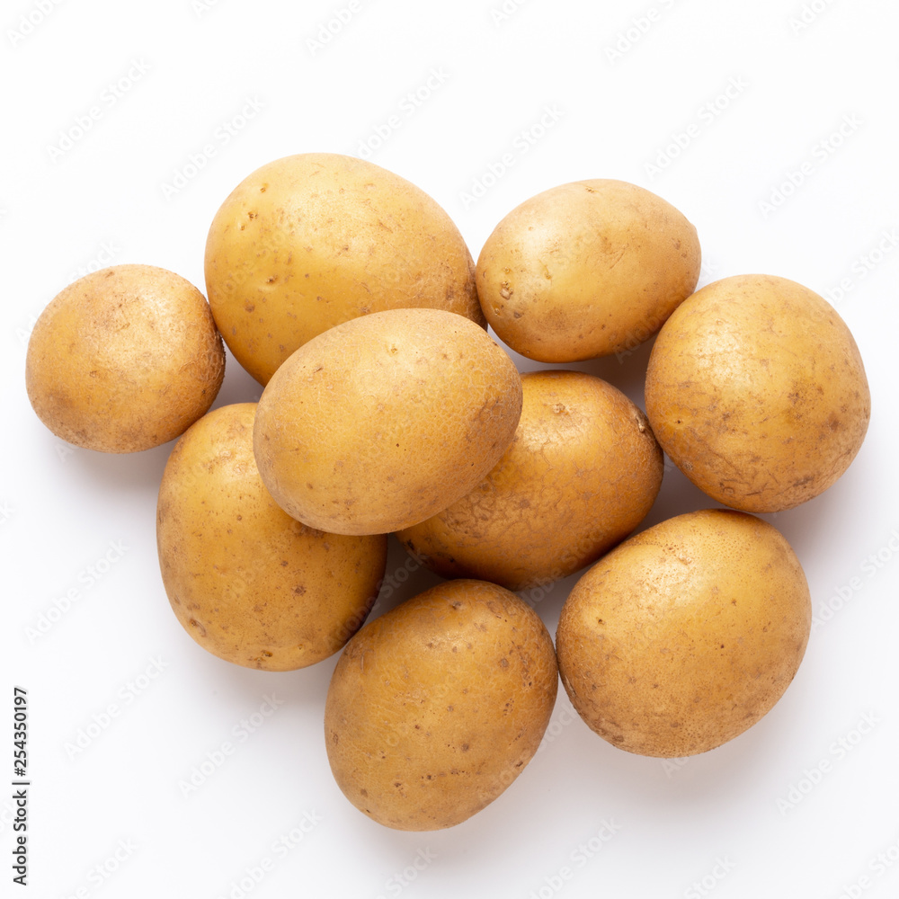 Potatoes isolated on white background. Flat lay. Top view. Potatoes isolated on white background. Flat lay. Top view.