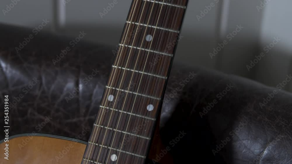 Tilt-up shot of a 12-string guitar Tilt-up shot of a 12-string guitar