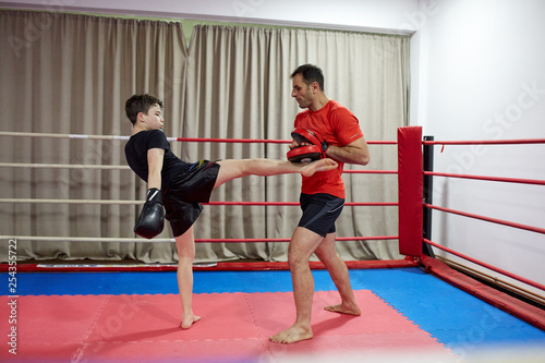 Kickboxer kid and his coach