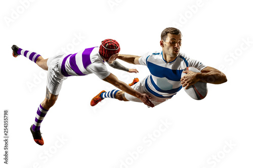 The silhouette of two caucasian rugby male players isolated on white background. Studio shot of fit men in motion or movement with ball. Jump and action concept. An incredible strain of all forces. © master1305