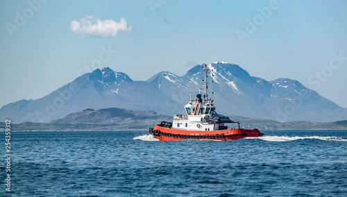 tugboat in the fjord fairways of northern Norway photo