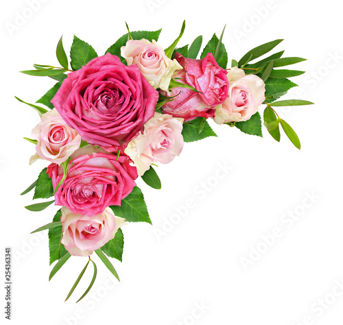 Beautiful pink and white rose flowers with eucalyptus leaves in a corner arrangement