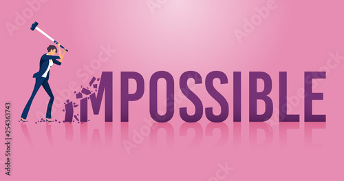 Businesswoman destroying the word impossible to possible