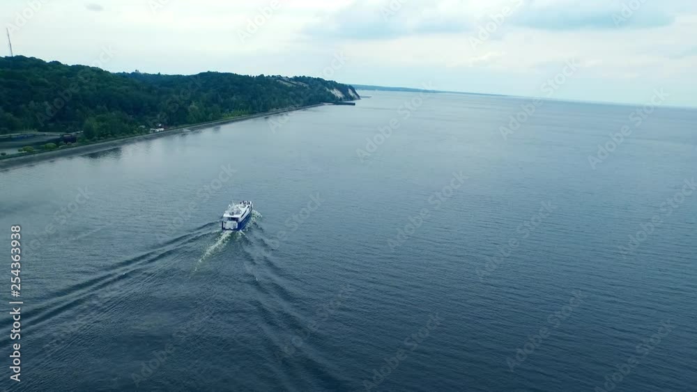 Private ship sailing mountain coastline. Luxury yacht sailing city river. Private ship sailing mountain coastline. Luxury yacht sailing city river.
