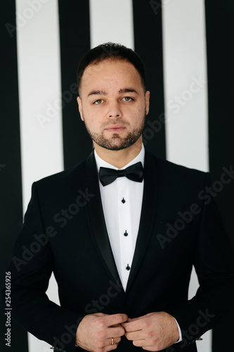 Elegant young handsome man. Studio fashion portrait