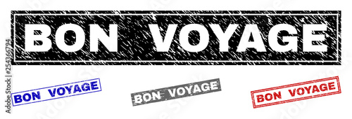 Grunge BON VOYAGE rectangle stamp seals isolated on a white background. Rectangular seals with grunge texture in red, blue, black and gray colors.