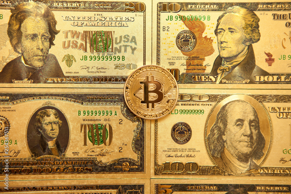 Bitcoin golden coin cryptocurrency on golden US dollar.