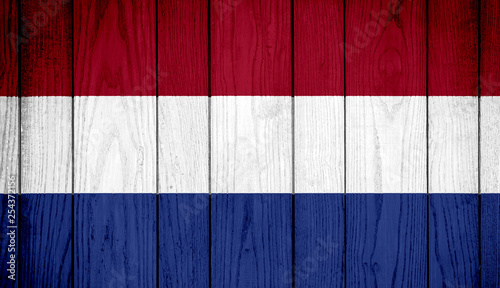 Flag of Netherlands on wooden background