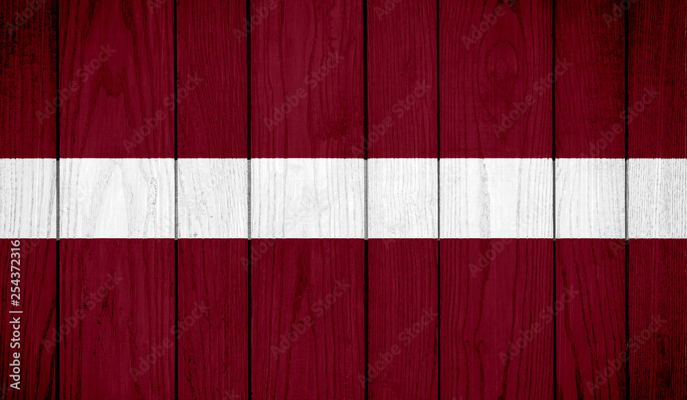 Flag of Latvia on wooden background