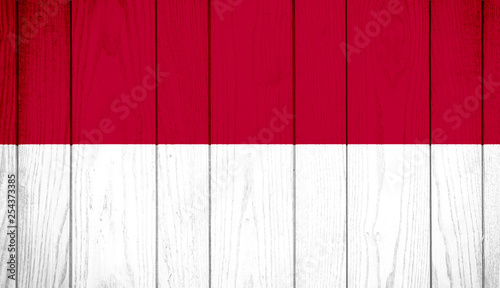 Flag of Indonesia on wooden background