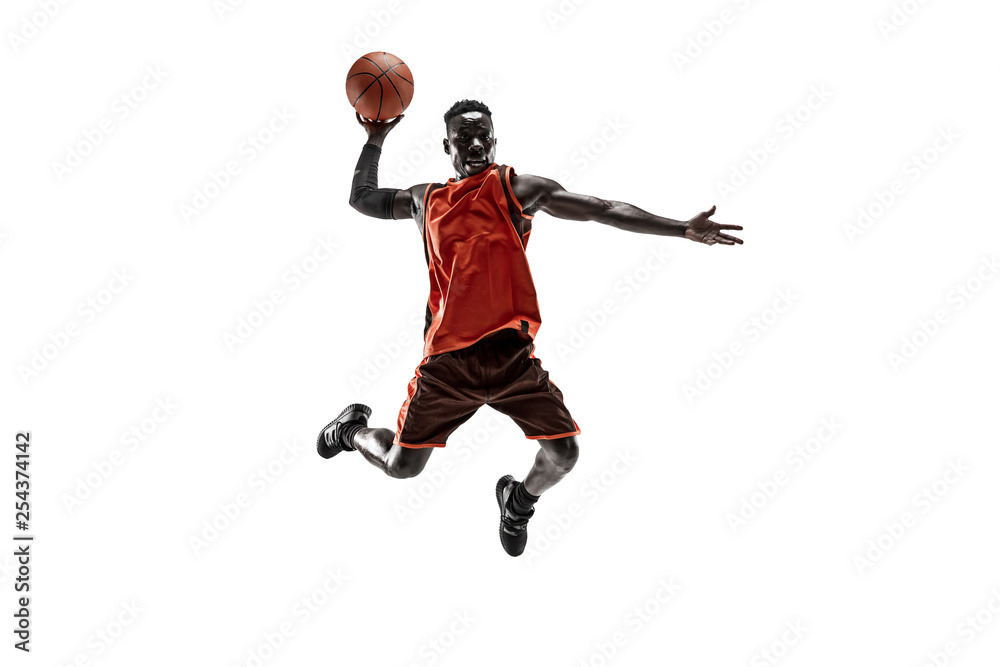 Full length portrait of a basketball player with a ball isolated on white studio background. advertising concept. Fit african american athlete jumping with ball. Motion, activity, movement concepts.