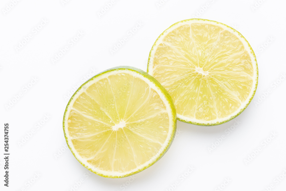 Composition with fresh ripe limes on light background, top view