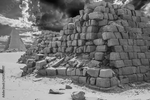 Black and white picture of a largely destroyed pyramid in Sudan photo