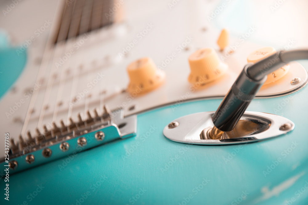 Details and connection of guitar and wire cable jack. Tone and volume controls Details and connection of guitar and wire cable jack. Tone and volume controls