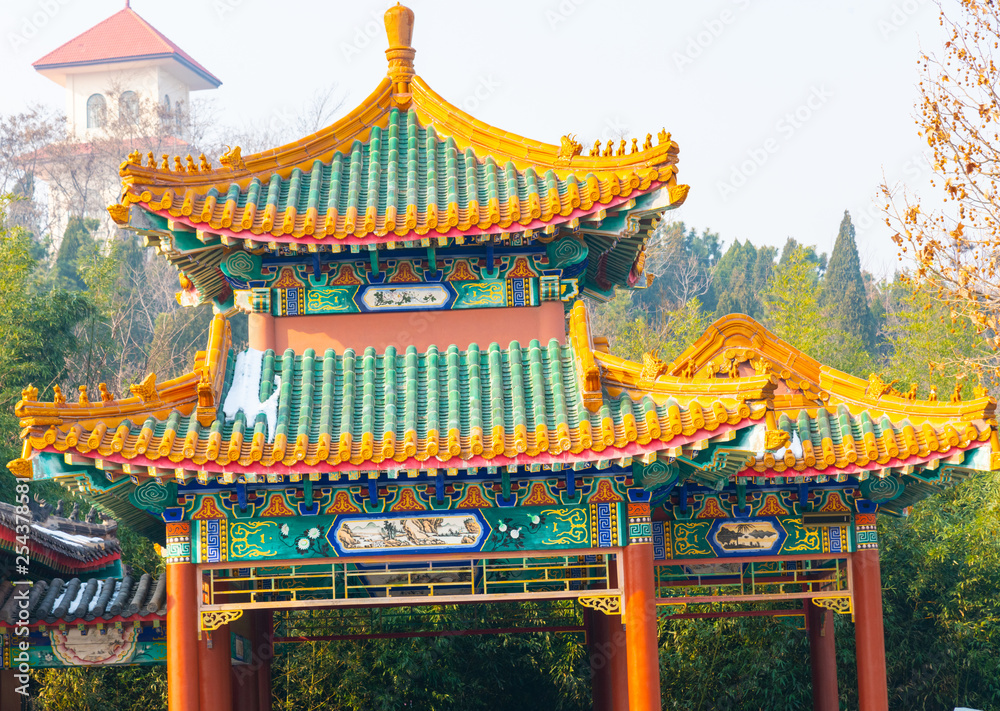 Fototapeta premium traditional Chinese architecture and pavilion in the complex of nanshan temple at longkou City in Lushan Mountain in Shandong Province of China