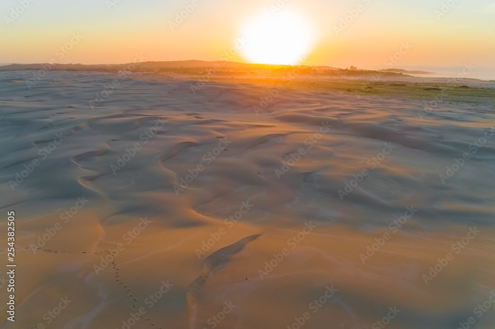 Breathtaking sunrise over famous sand dunes at Anna Bay, New South Wales, Australia