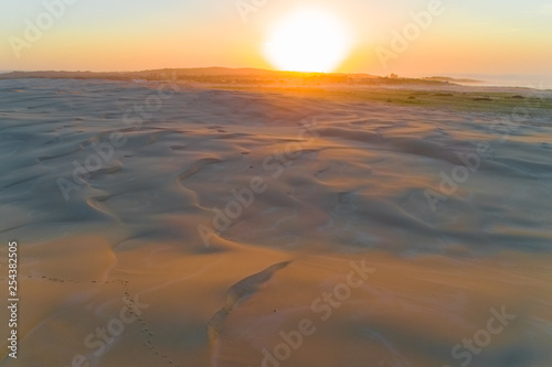 Breathtaking sunrise over famous sand dunes at Anna Bay, New South Wales, Australia