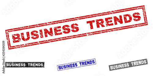 Grunge BUSINESS TRENDS rectangle stamp seals isolated on a white background. Rectangular seals with grunge texture in red, blue, black and grey colors.