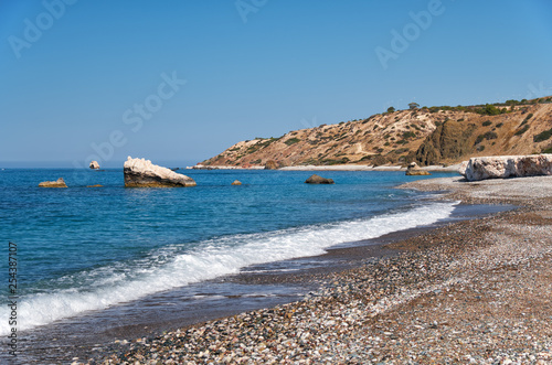 Petra tou Romiou or Aphrodite Rock Beach, one of the main attractions and landmarks of Cyprus island. © Serg Zastavkin