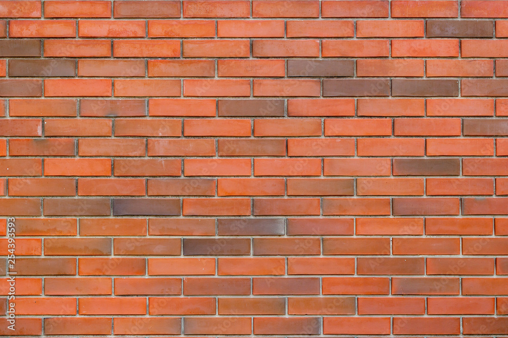 Texture of a red and brown brick wall background Texture of a red and brown brick wall background