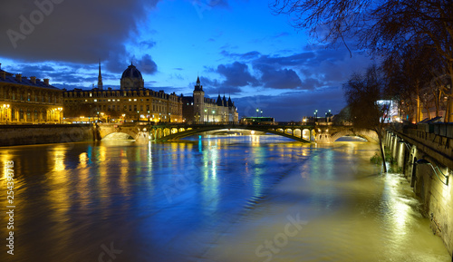Paris by night. Night view of Paris flood as river Seine rises and approaches record level. January 2018, view from Hotel de Ville at Ile de la Cite © trialartinf