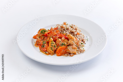 chicken with buckwheat on the white background