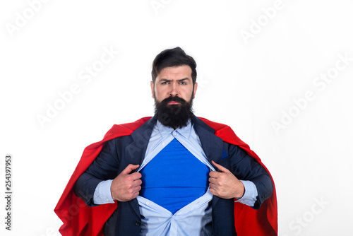 Superman in red cape showing blue shirt. Save the world. Superhero. Red Superman Cape. Safety hero. Symbol s. Business growth. Super power. Career growth. photo