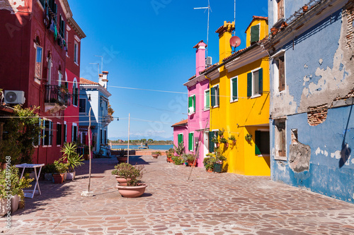 colorful burano island and and blue house with shabby plaster © Angelika Smile
