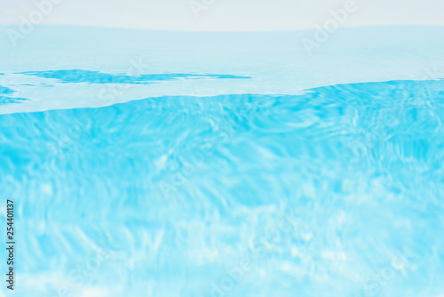 Transparent underwater texture and background of pool water