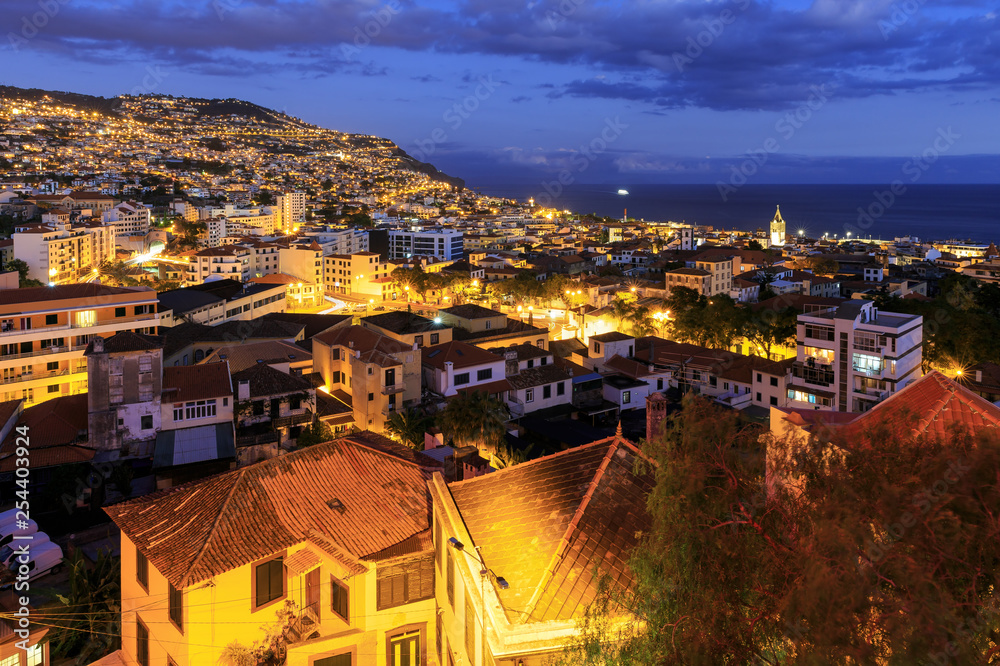 Beautiful cityscape panorama of the city Funchal, on the island Madeira at night in summer