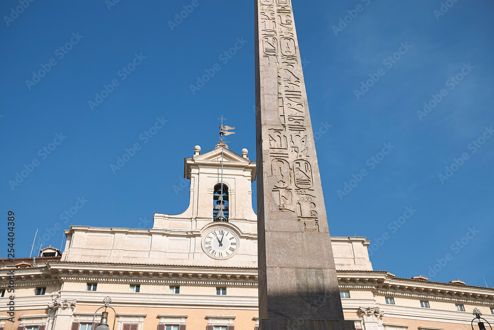 Roma, Italy - February 09, 2019 : View of the Montecitorio obelisk and Palazzo Montecitorio on the background