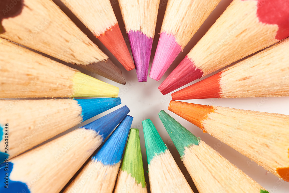 Naklejka premium Multicolored pencils background arranged in background