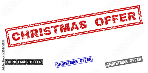 Grunge CHRISTMAS OFFER rectangle stamp seals isolated on a white background. Rectangular seals with grunge texture in red, blue, black and gray colors.