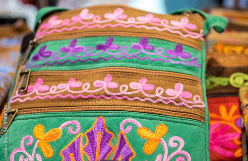 Handmade embroidered handbags for sale at handicraft market