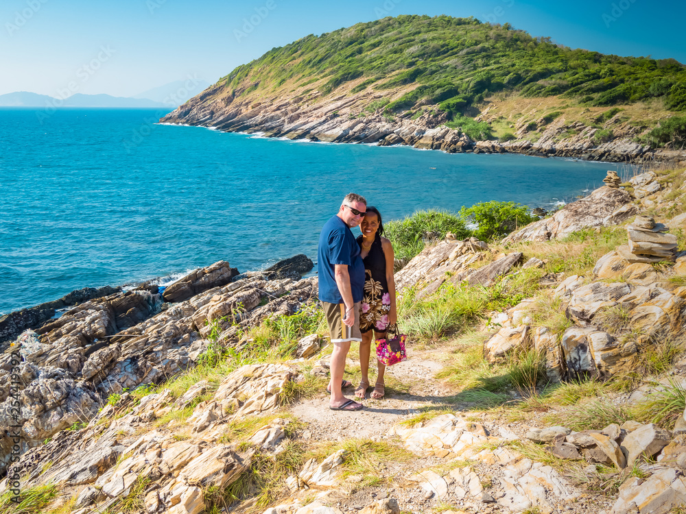 Fototapeta premium Portrait of a happy couple at the coast in Thailand