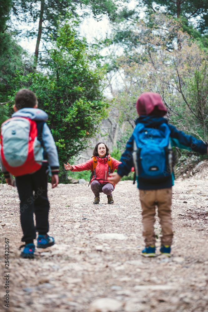Children run to mother. Children run to mother.