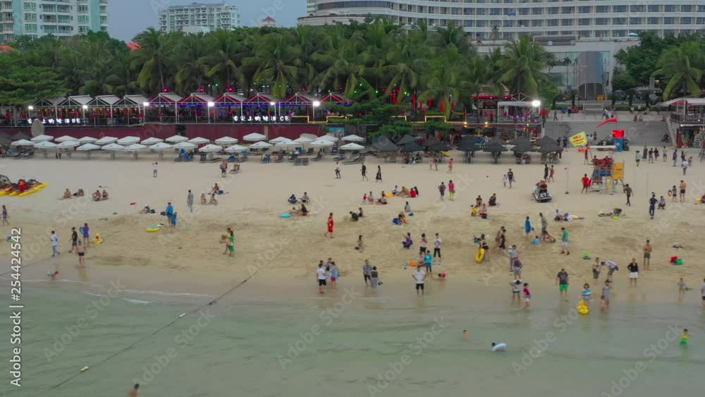 sunset sanya famous dadonghai crowded beach aerial panorama 4k hainan china sunset sanya famous dadonghai crowded beach aerial panorama 4k hainan china