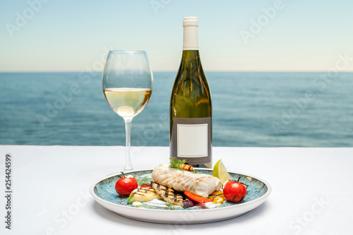 Dish with fish and wine