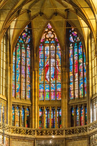 Prague  Czech Republic. Stained-glass windows at main nave of the St. Vitus Cathedral  part of the Prague Castle complex. The frescoes  14th-16th centuries  depict scenes from the passion of Christ.