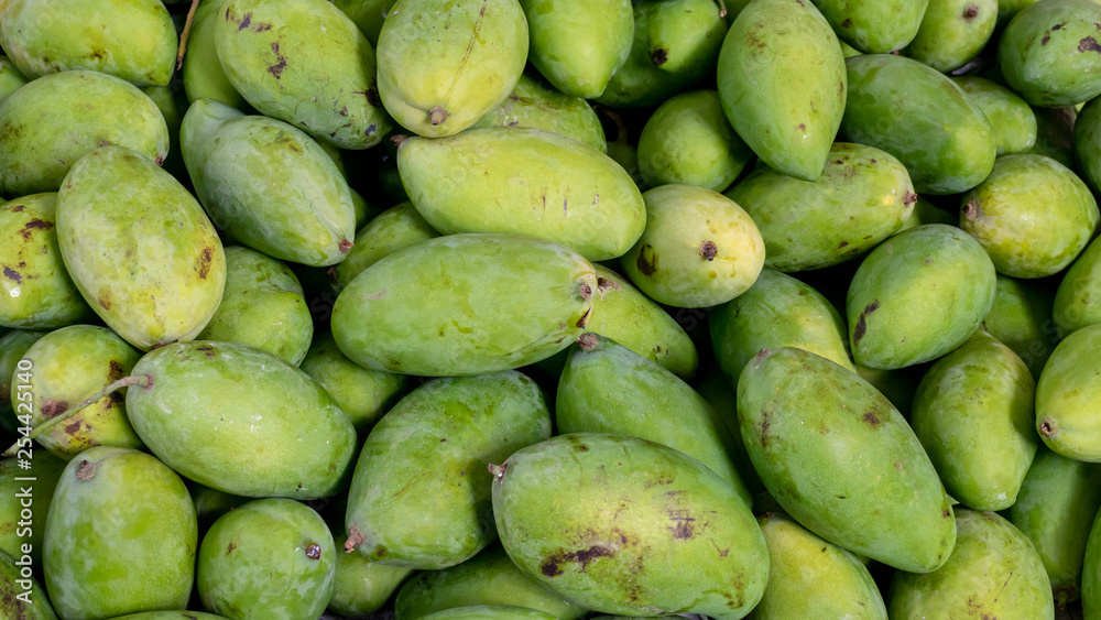 Close up of Ripe mangoes sold in the fruit market Close up of Ripe mangoes sold in the fruit market