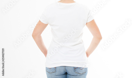Back view - woman in white t-shirt isolated mock up, copy space, empty tshirt. Girl in t shirt.