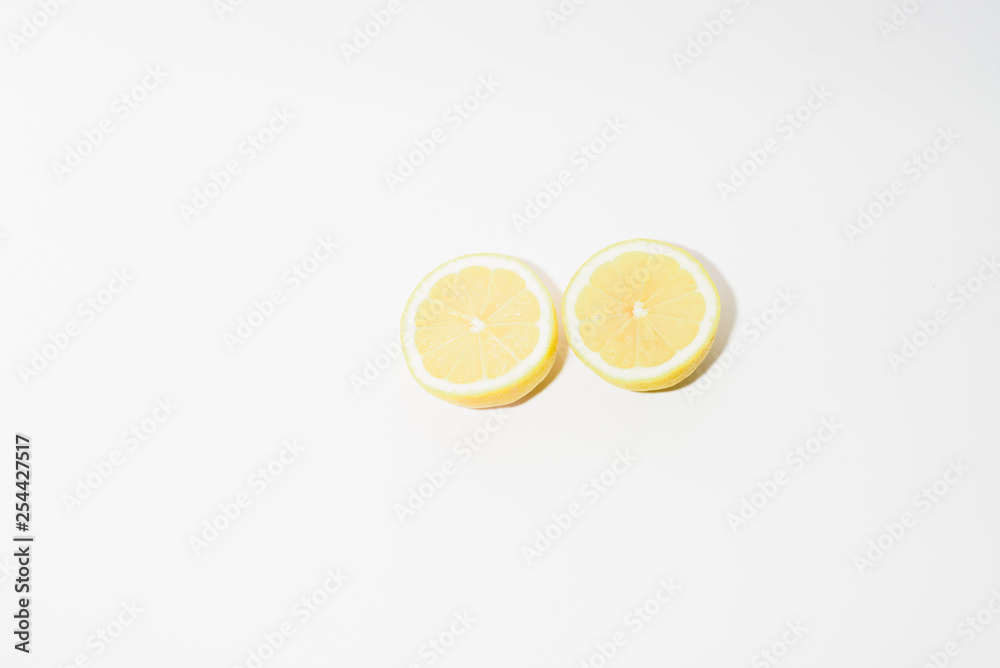 two half lemons on white background two half lemons on white background