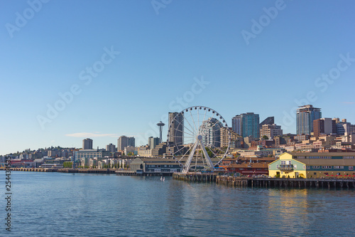 A view on Seattle city from the Puget Sound bay waters  USA. Cityscape on a sunny afternoon in summer.
