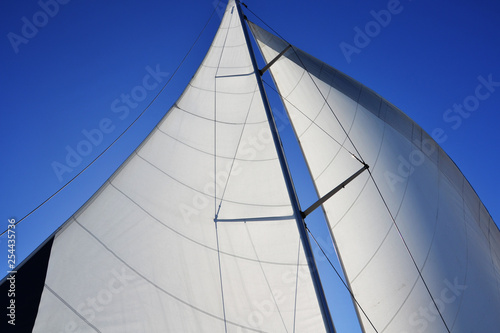 sail yacht against the blue sky
